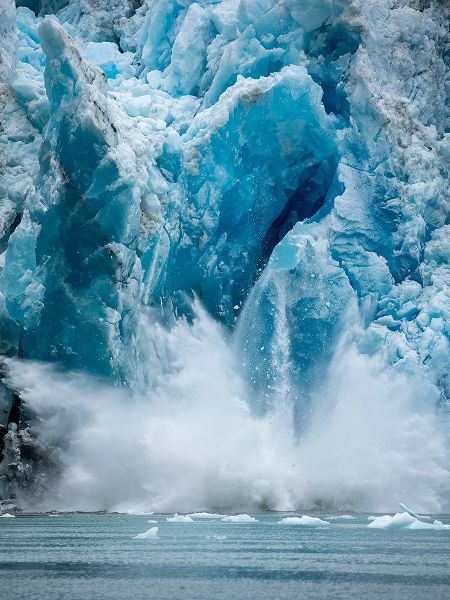 Alaska-Tracy Arm-Massive iceberg calving from face of South Sawyer Glacier in Tracy Arm